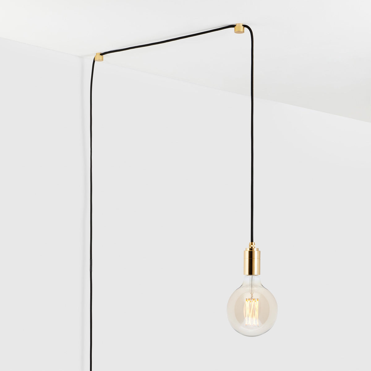 Brass plug store in pendant light