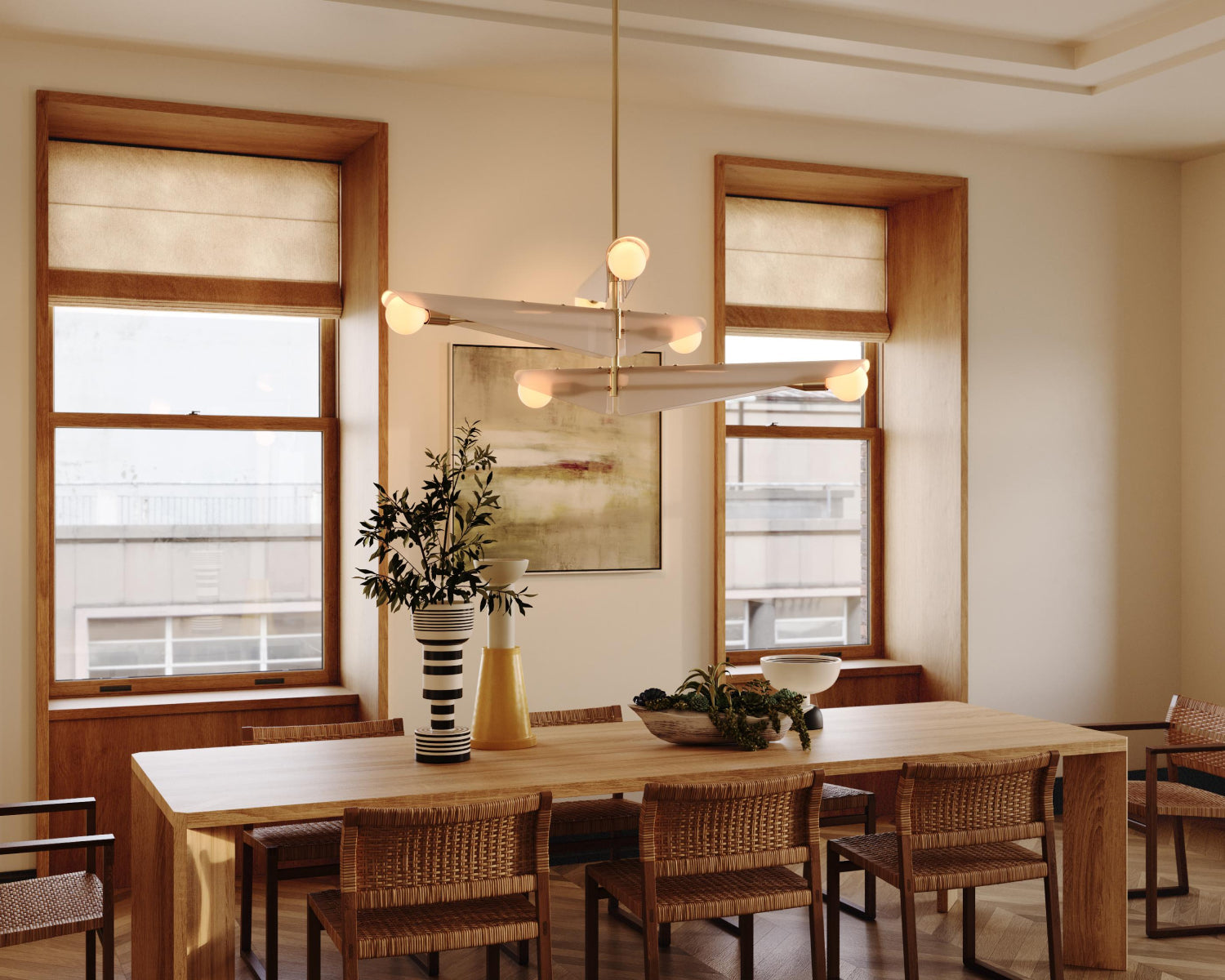 Dining room with sycamore chandelier hanging above dining table