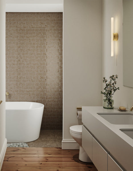 Kilter Wall Light, and IP44-rated light, in a bathroom setting