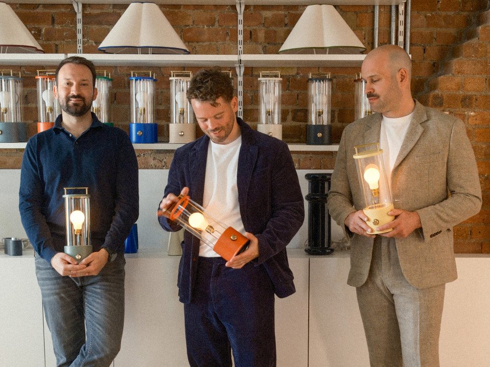 Tala founders Maxwell Wood, Joshua Ward, and William Symington outside Tala's London studio space.